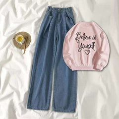 Pink Sweat Shirt Believe in Yourself with Blue Wide Jeans
